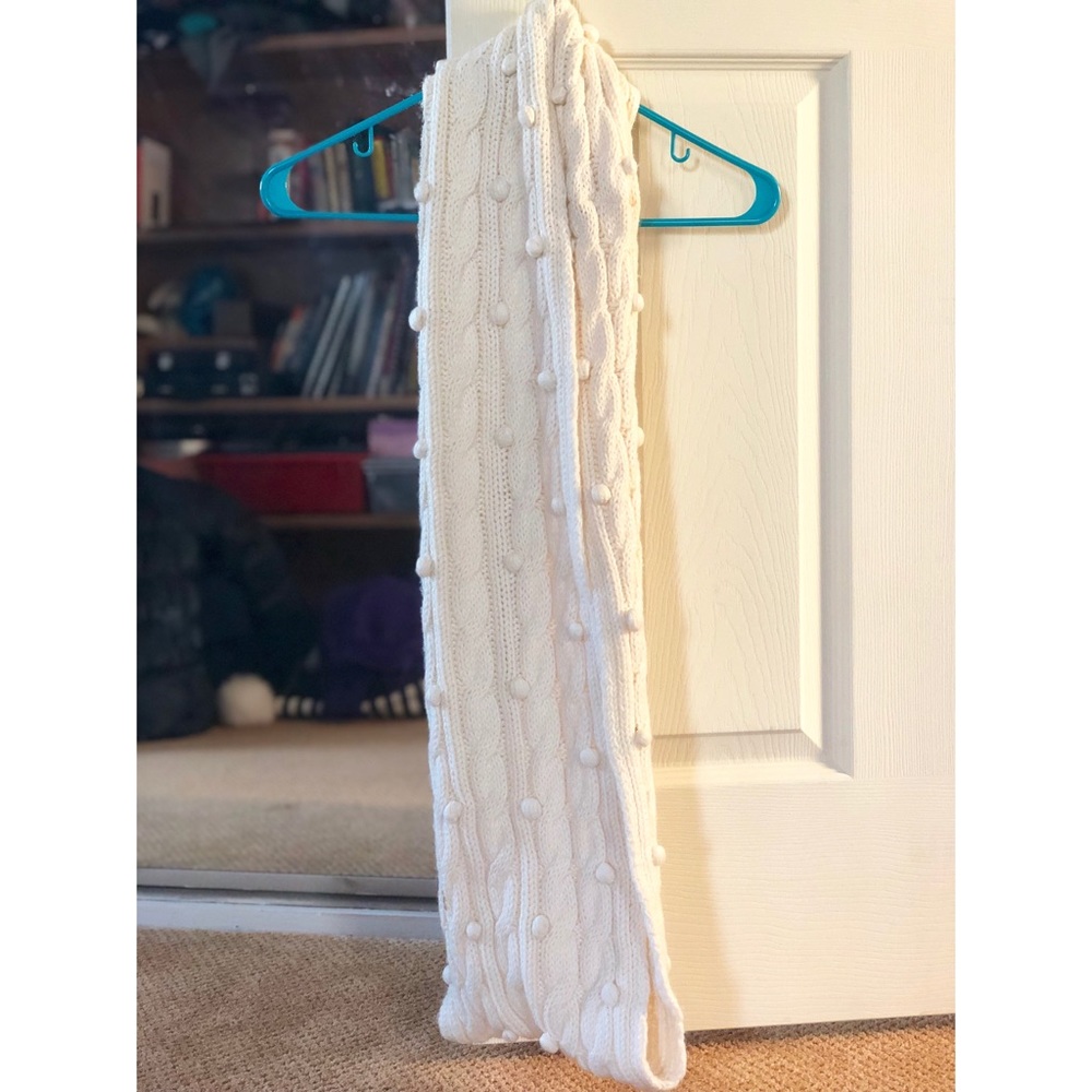 CREAM INFINITY SCARF WITH POMPOMS